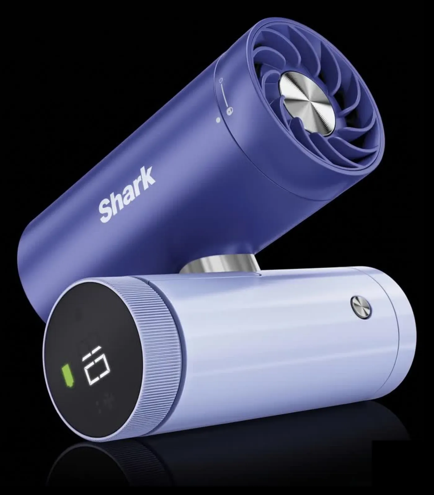 Blue and lavender Shark handheld fans arranged together against a dark background.